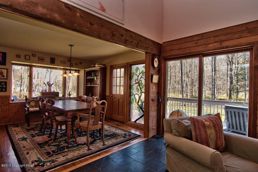 465 Pensyl Creek Road Stroudsburg, PA 18360 - Photo 7 of 80 a view of a dining room with furniture window and wooden floor