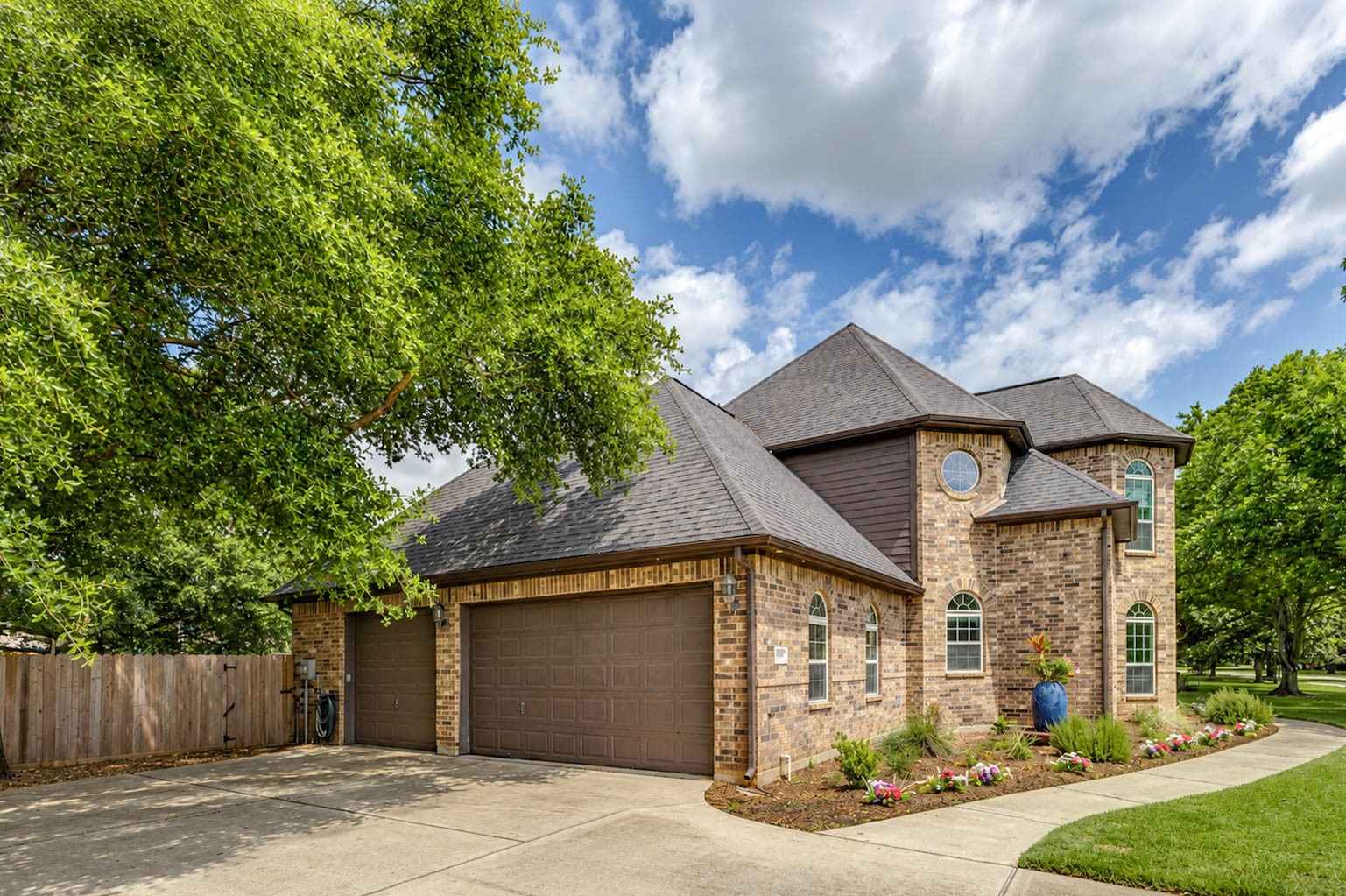5327 Whitmore Fulshear, TX 77441 - Photo 45 of 50 The spacious three-car garage provides abundant parking and storage, while updated garage door mechanisms and MyQ capability add everyday convenience.