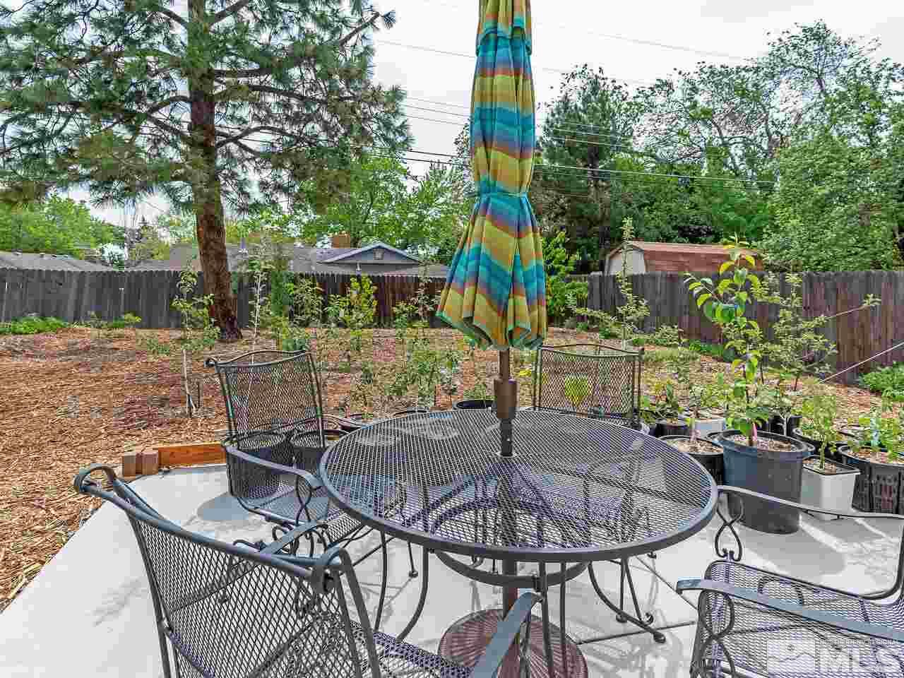 730 Beldon Way Reno, NV 89503 - Photo 21 of 27 a table and chairs sitting in the patio