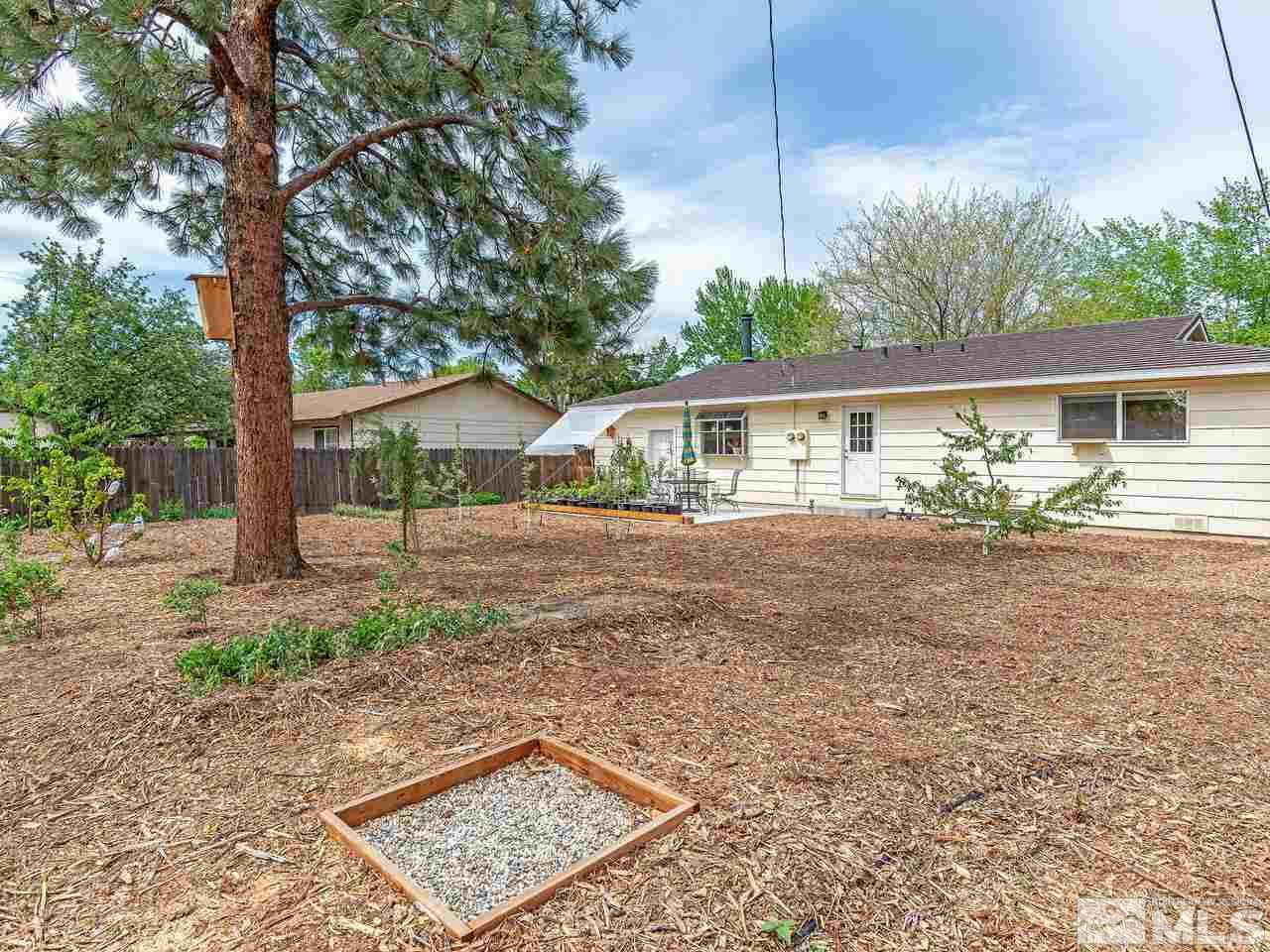730 Beldon Way Reno, NV 89503 - Photo 24 of 27 a front view of a house with garden