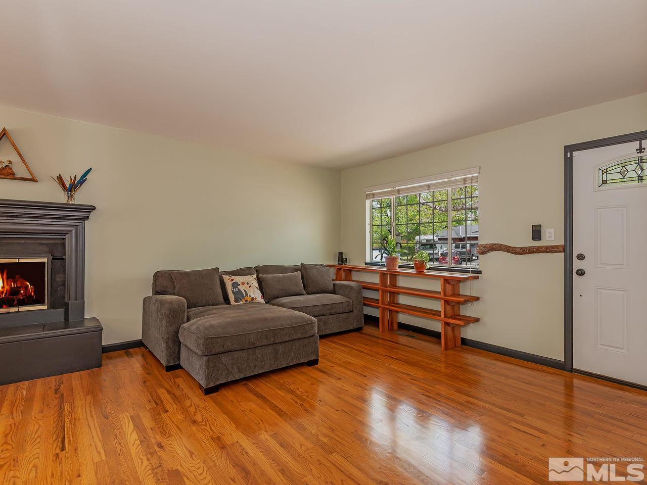 730 Beldon Way Reno, NV 89503 - Photo 5 of 27 a living room with furniture and a fireplace