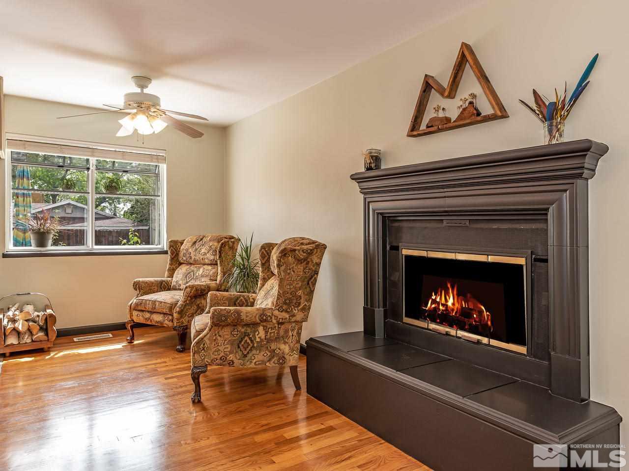 730 Beldon Way Reno, NV 89503 - Photo 8 of 27 a living room with furniture and a fireplace