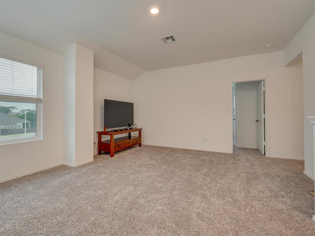 1208 Sweetspire Street Leander, TX 78641 - Photo 21 of 36 Spacious room featuring neutral carpet flooring and white painted walls