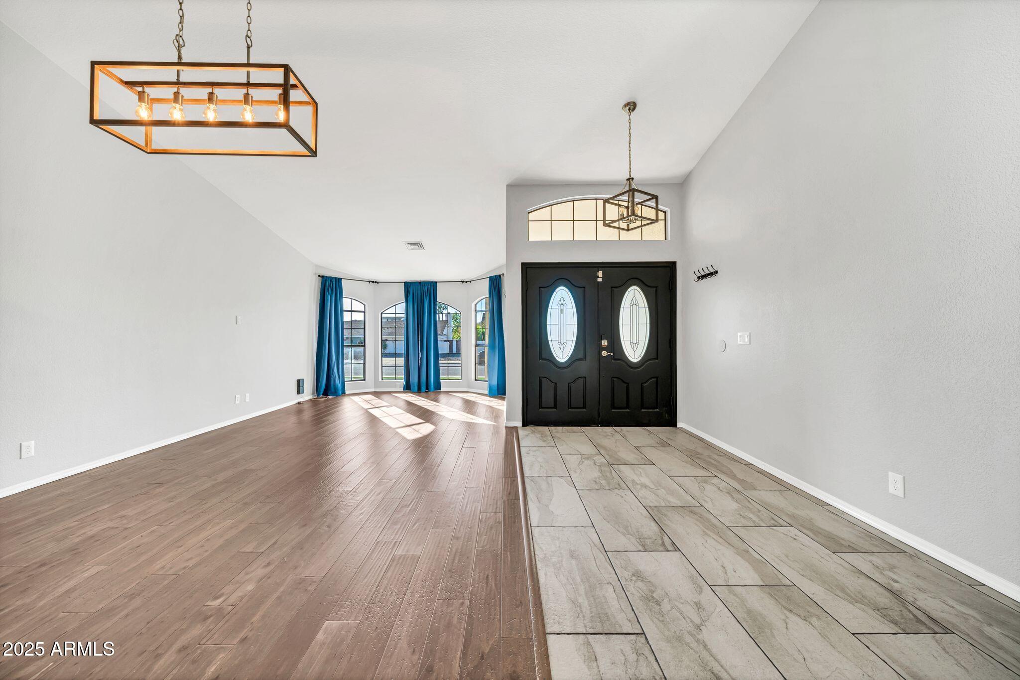 5044 East Paradise Lane Scottsdale, AZ 85254 - Photo 10 of 61 a view of an entryway with wooden floor
