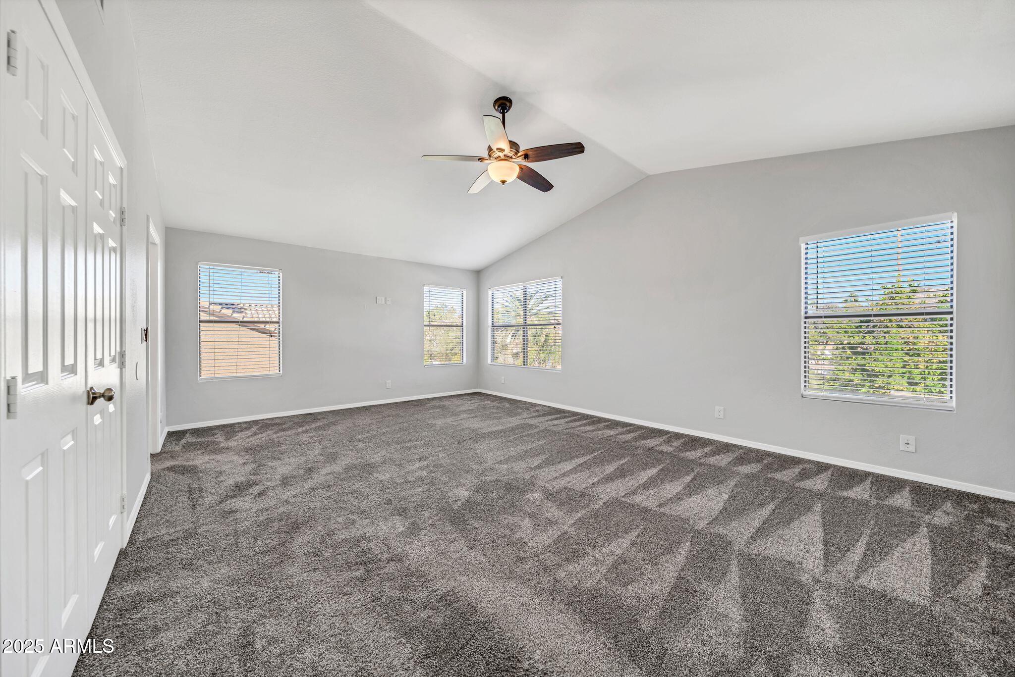 5044 East Paradise Lane Scottsdale, AZ 85254 - Photo 18 of 61 wooden floor in an empty room with a window