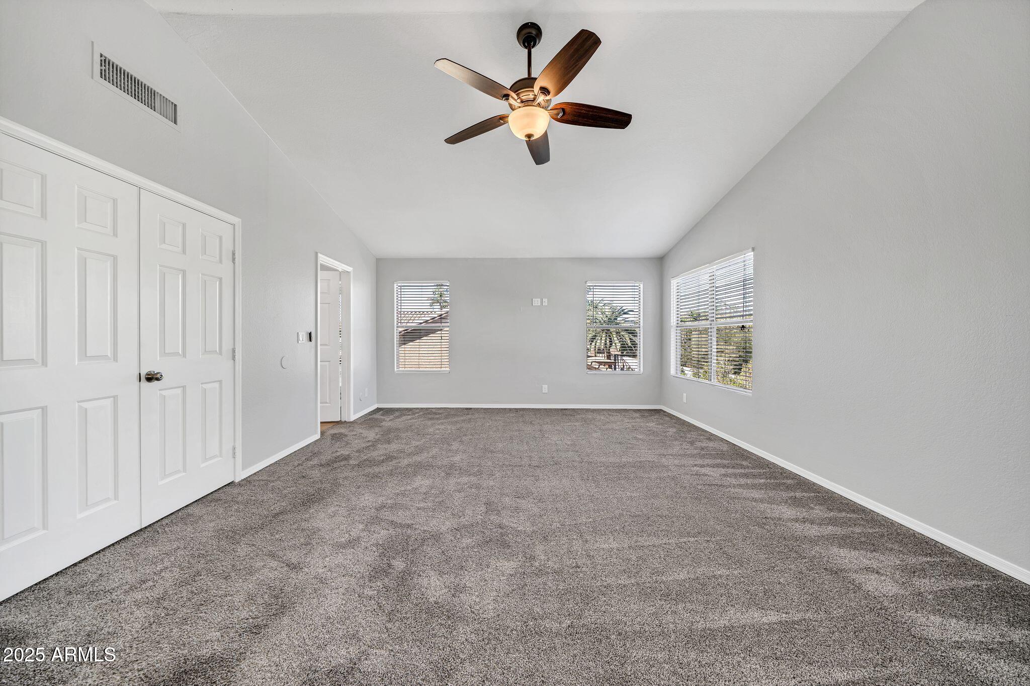 5044 East Paradise Lane Scottsdale, AZ 85254 - Photo 20 of 61 a view of an empty room with a window