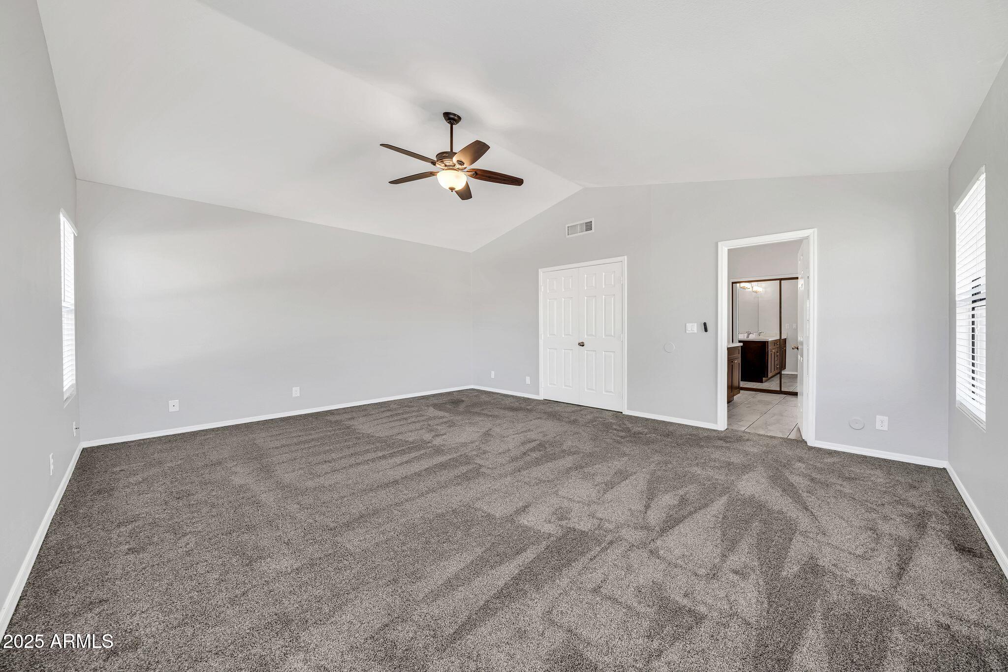 5044 East Paradise Lane Scottsdale, AZ 85254 - Photo 23 of 61 a view of empty room with a ceiling fan