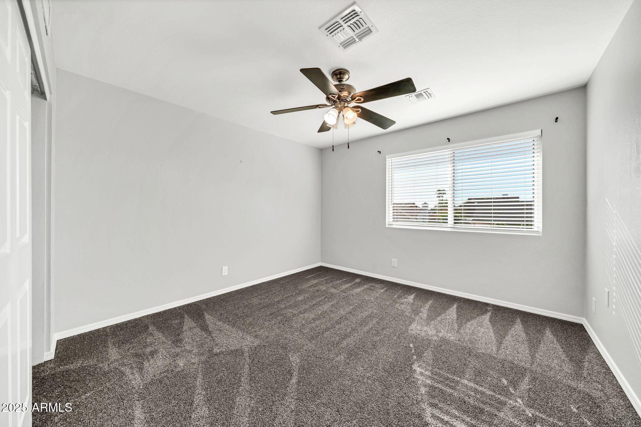 5044 East Paradise Lane Scottsdale, AZ 85254 - Photo 26 of 61 a view of an empty room with a window