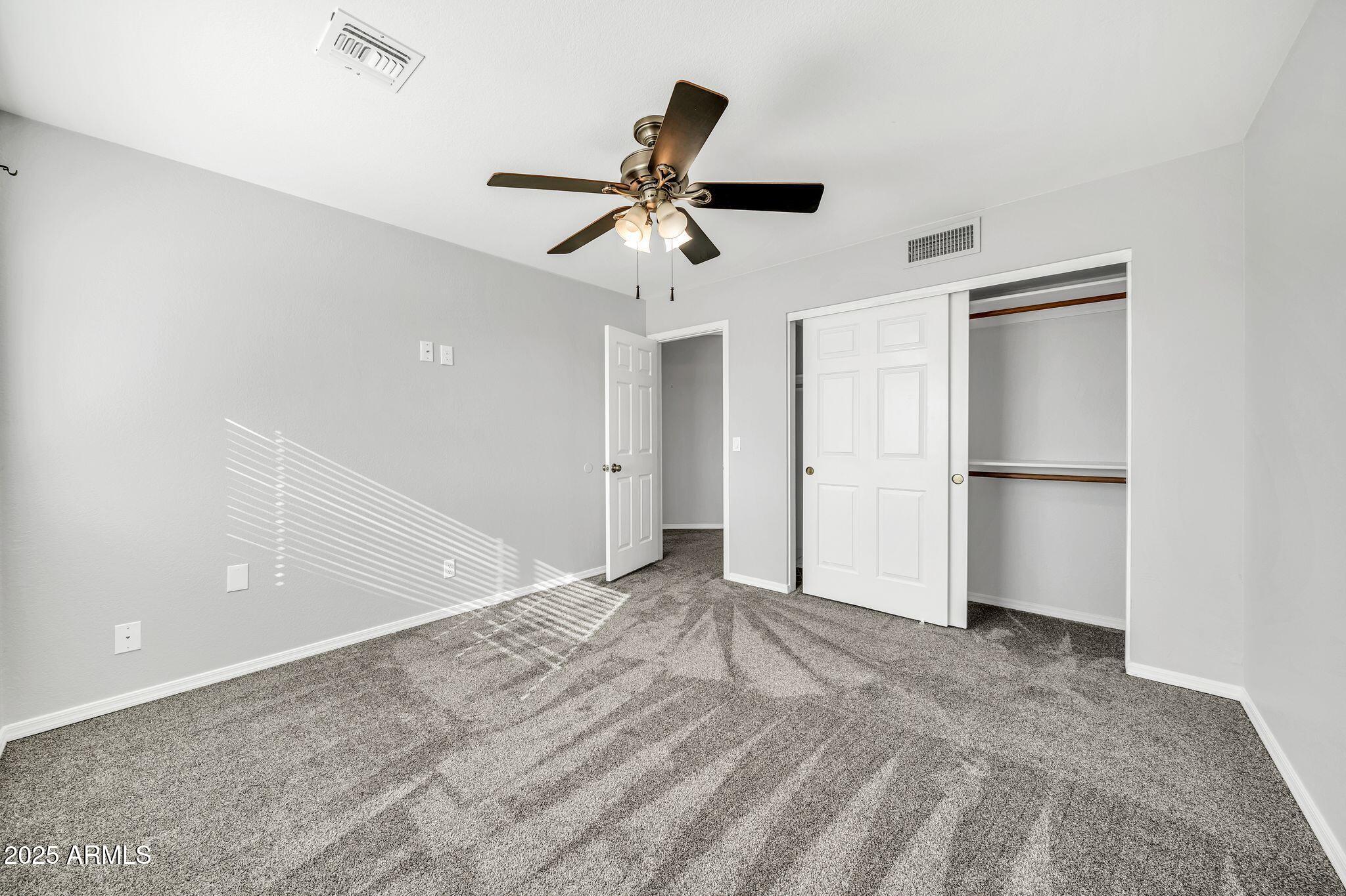 5044 East Paradise Lane Scottsdale, AZ 85254 - Photo 28 of 61 a view of empty room with ceiling fan