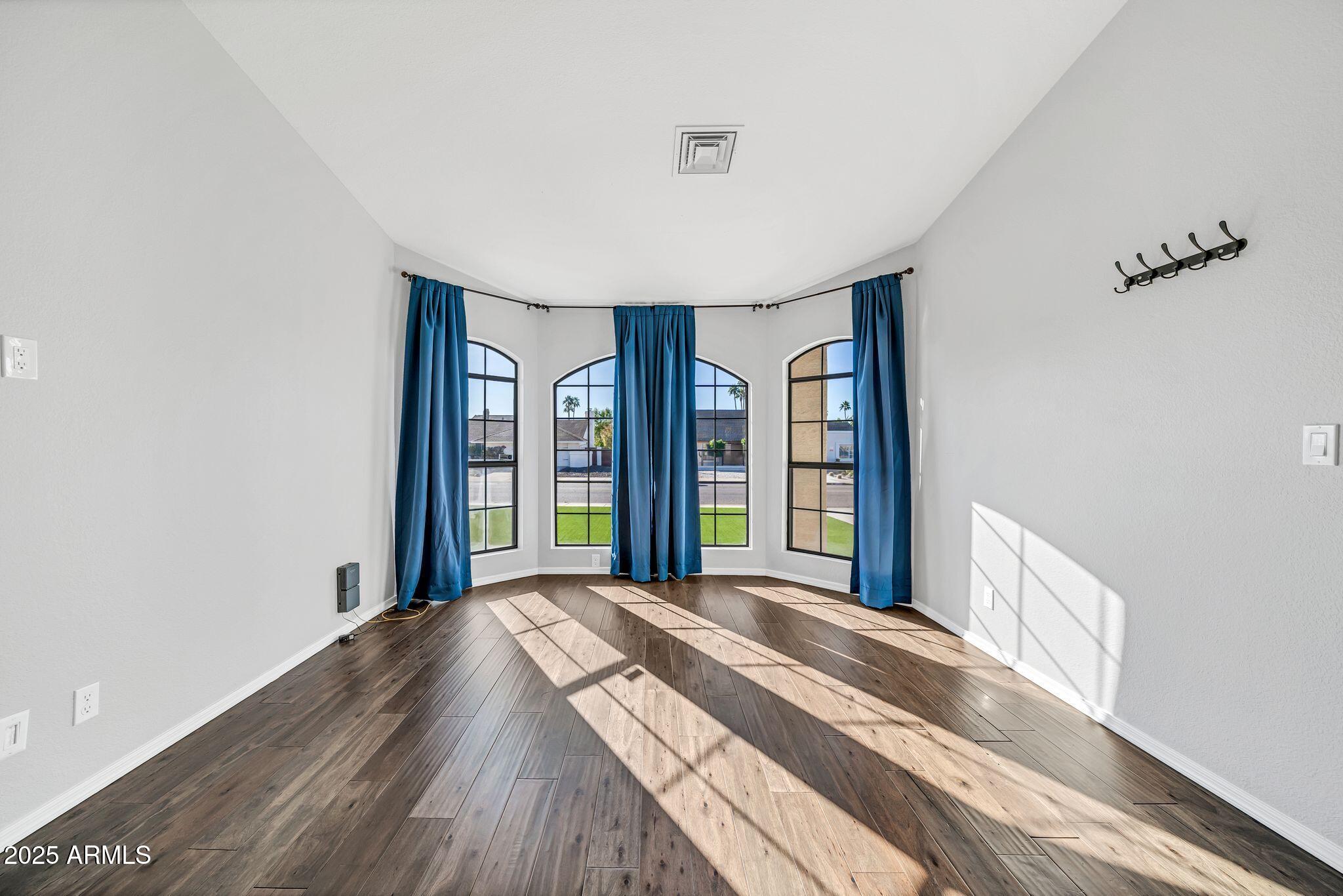 5044 East Paradise Lane Scottsdale, AZ 85254 - Photo 40 of 61 a view of a bedroom with large windows