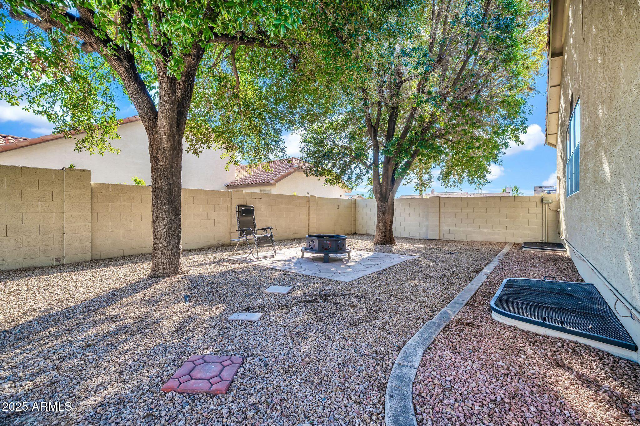 5044 East Paradise Lane Scottsdale, AZ 85254 - Photo 47 of 61 a view of a house with backyard and a tree