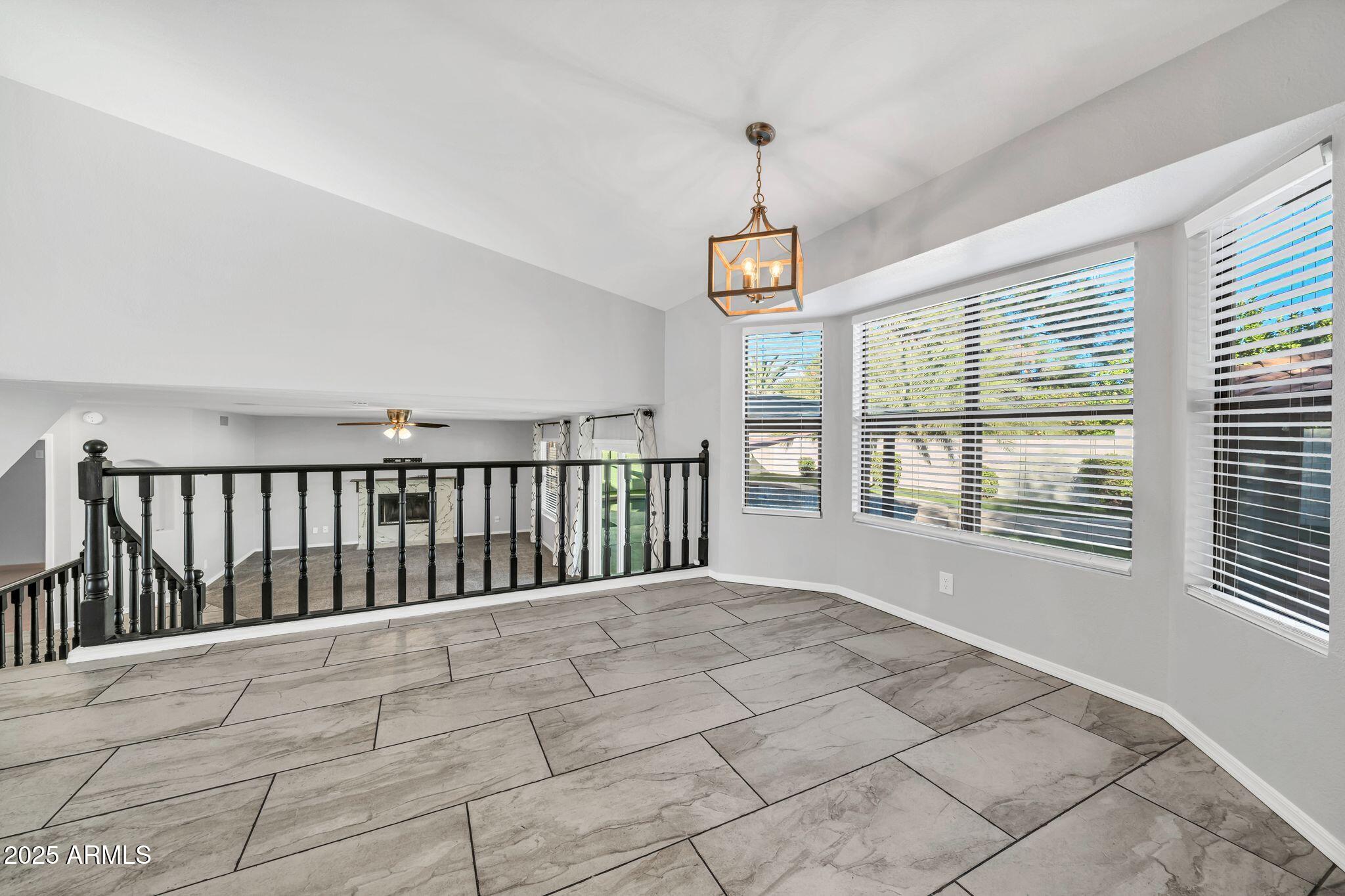 5044 East Paradise Lane Scottsdale, AZ 85254 - Photo 4 of 61 a view of an empty room with a window
