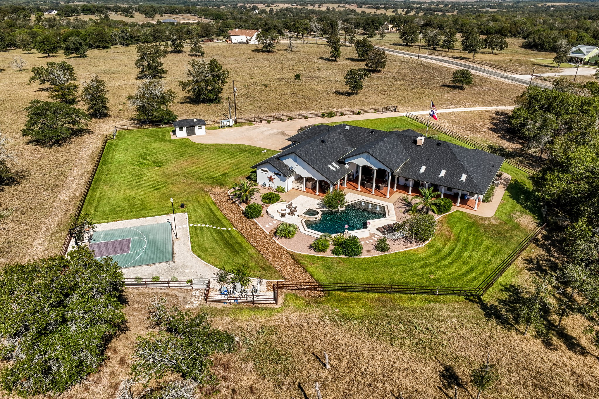 547 Powder Ridge Luling, TX 78648 - Photo 13 of 50 an aerial view of a house with outdoor space swimming pool and lake view