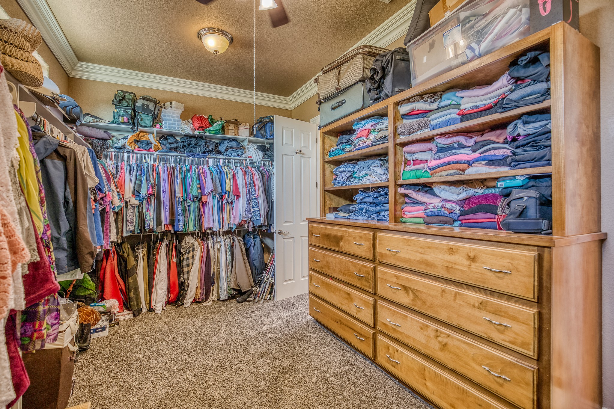 547 Powder Ridge Luling, TX 78648 - Photo 32 of 50 a view of walk in closet with clothes