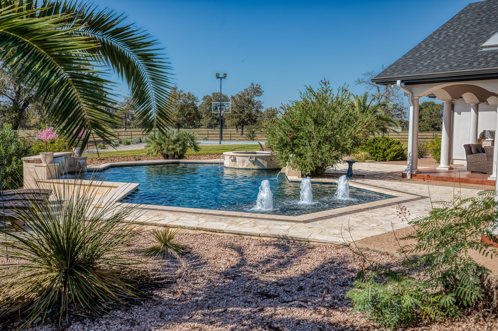 547 Powder Ridge Luling, TX 78648 - Photo 39 of 50 a view of a backyard with palm trees