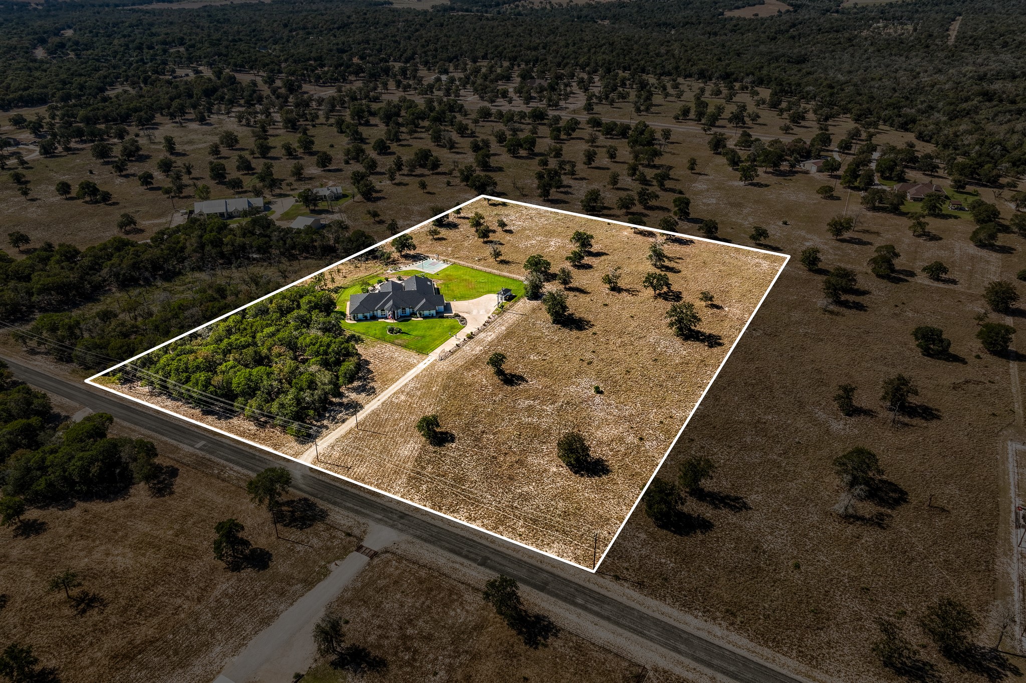 547 Powder Ridge Luling, TX 78648 - Photo 9 of 50 an aerial view of a blue and white wall