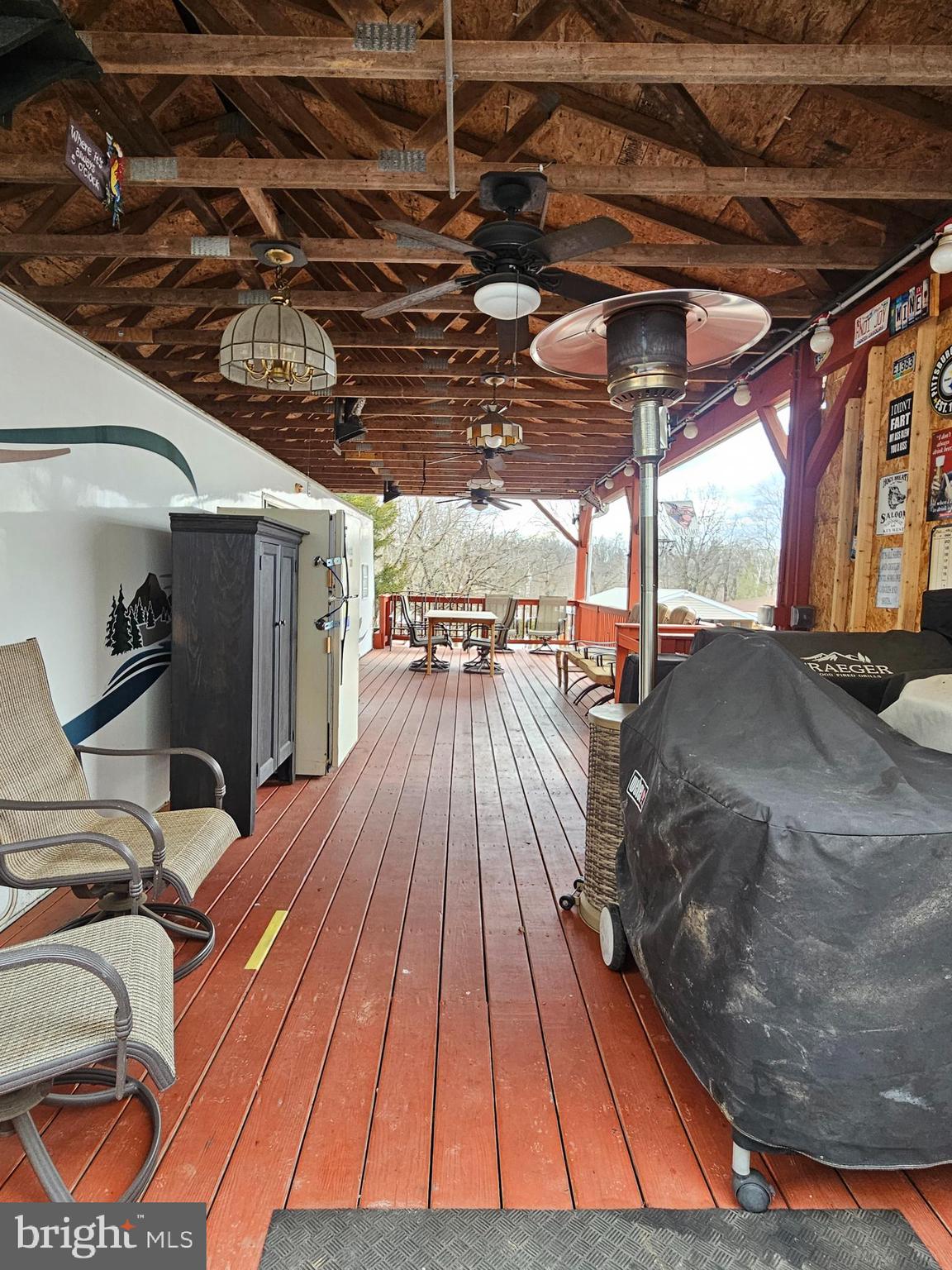 48 Hot Dog Road Falling Waters, WV 25419 - Photo 5 of 39 a view of a patio with a table and chairs