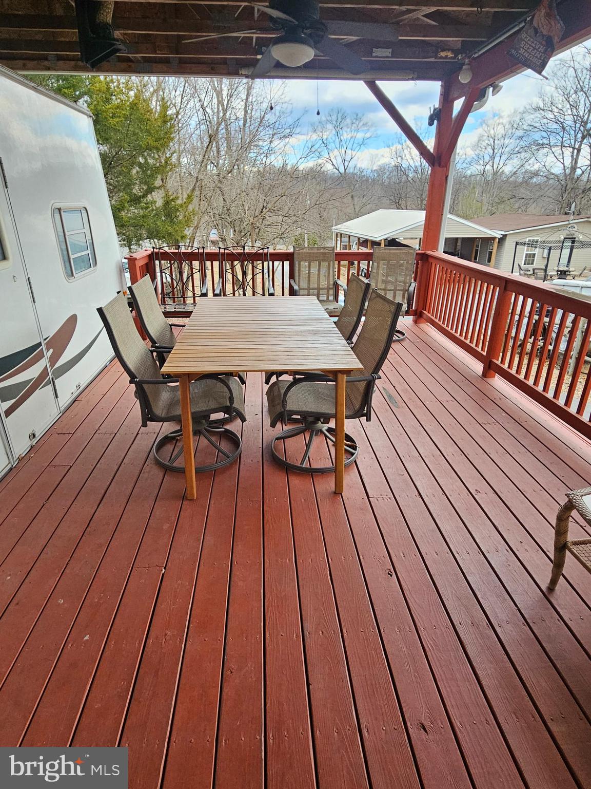 48 Hot Dog Road Falling Waters, WV 25419 - Photo 6 of 39 a view of balcony with wooden floor and outdoor seating