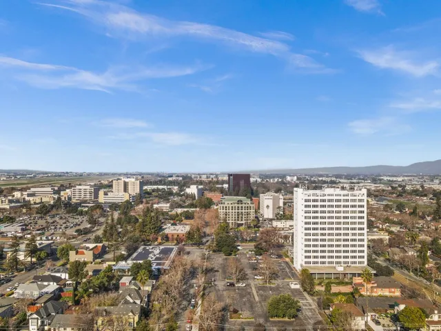 a front view of a building with street view