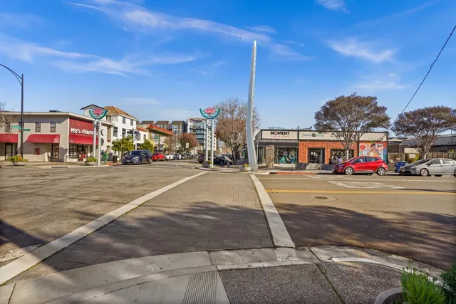 a view of a building with a street