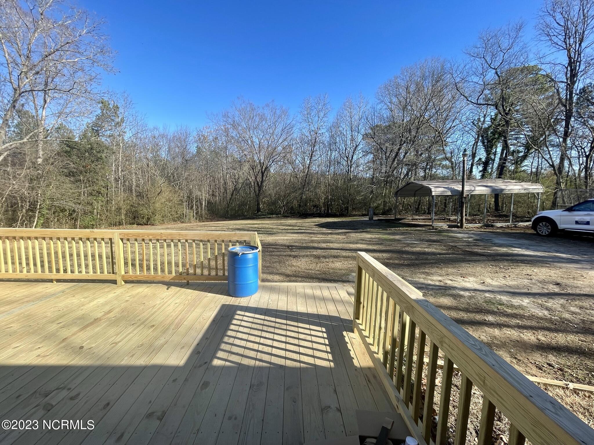 7627 High Road Sims, NC 27880 - Photo 9 of 26 Back yard and deck
