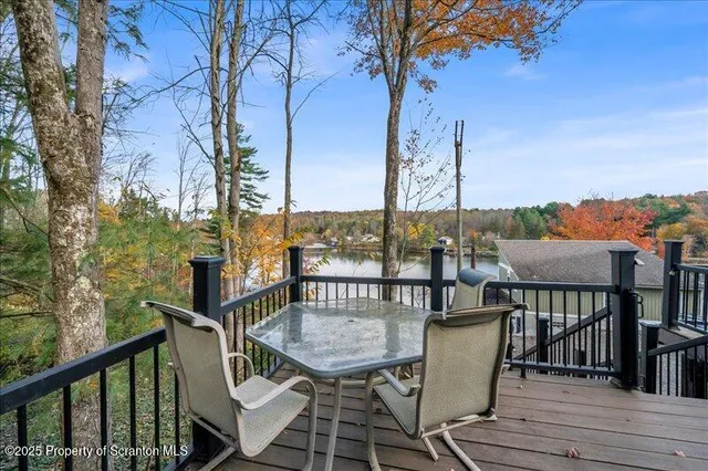a view of a balcony with furniture
