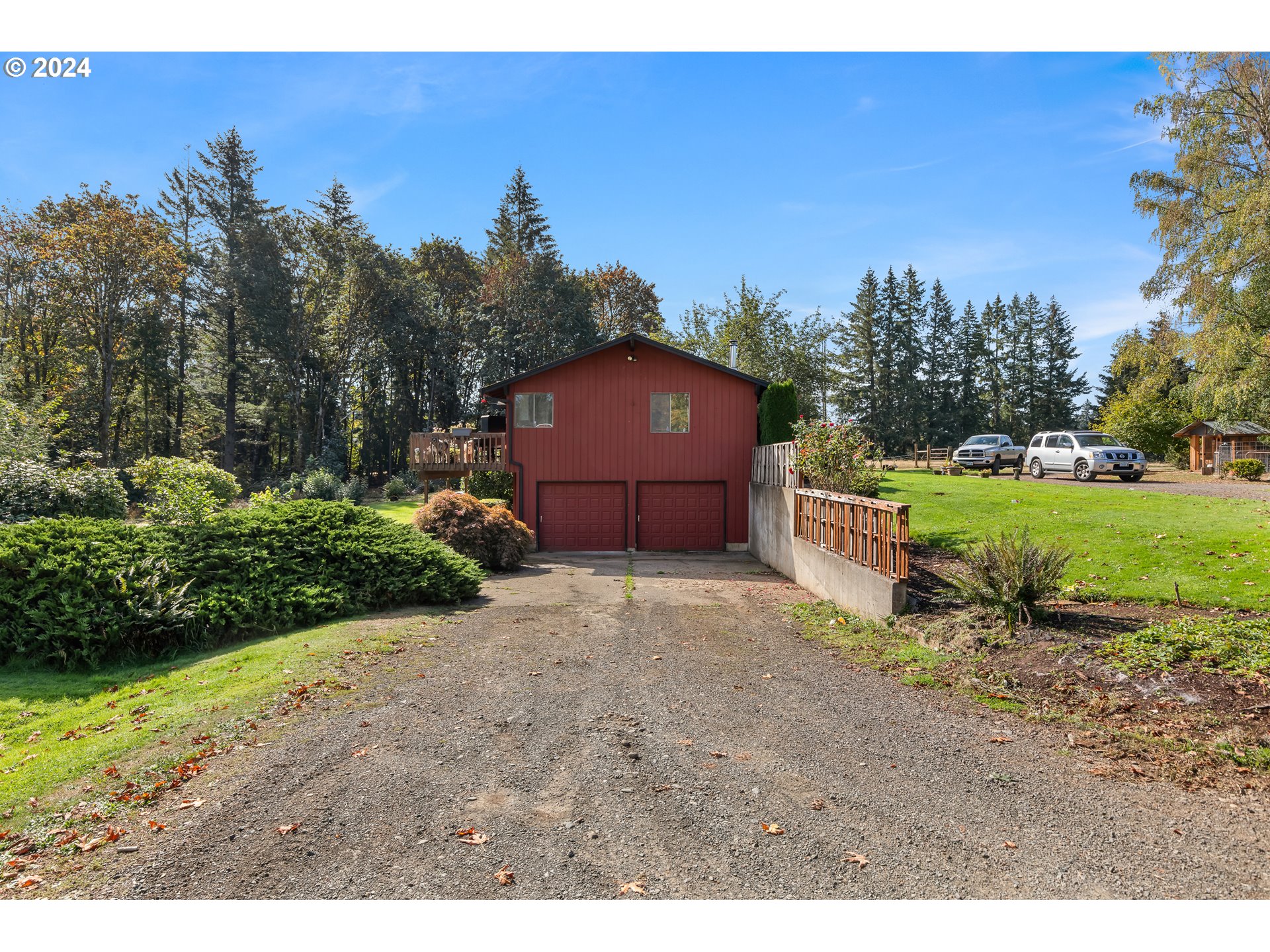 16370 Bell Street Sandy, OR 97055 - Photo 11 of 44 a backyard of a house with a yard and outdoor seating
