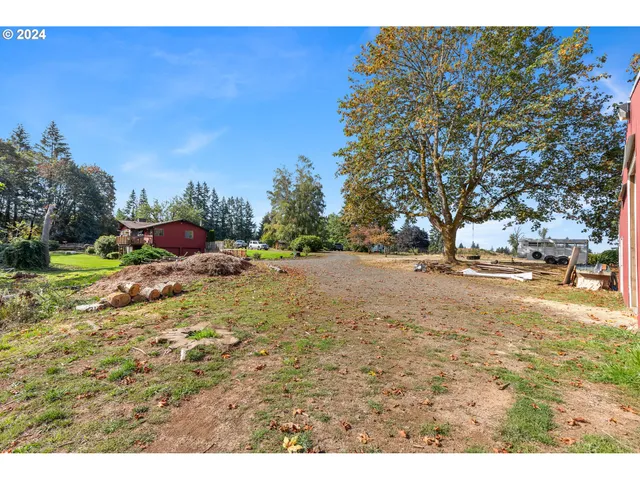 a view of a swimming pool with a yard
