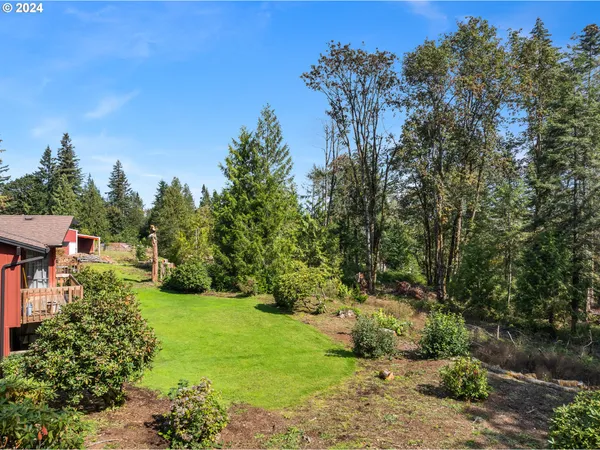 a view of a backyard with a garden