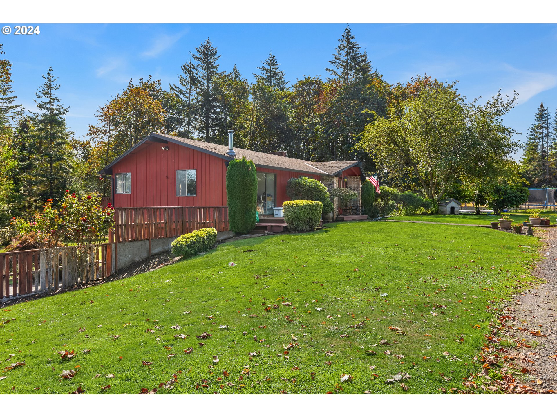 16370 Bell Street Sandy, OR 97055 - Photo 10 of 44 a view of a backyard with a garden