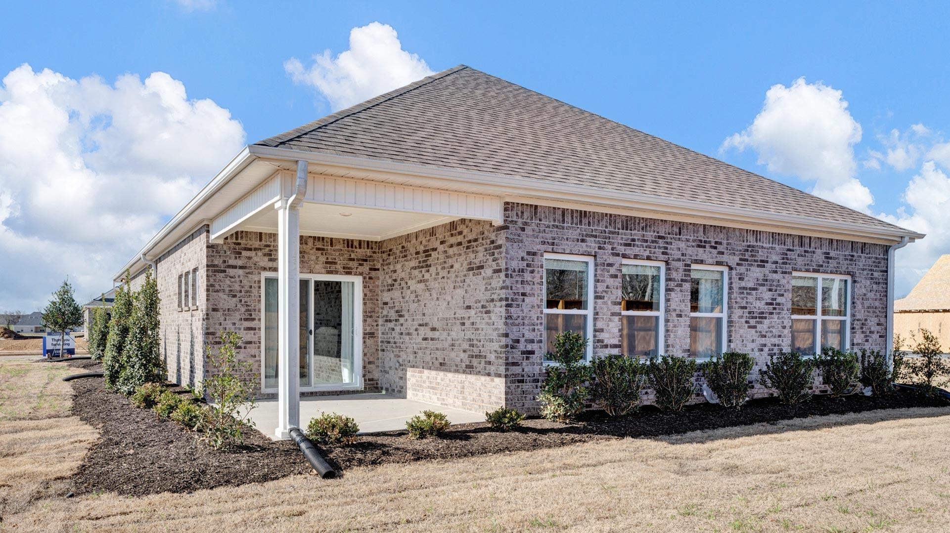 1020 Mewborn Farm Road Oakland, TN 38060 - Photo 27 of 36 a front view of a house with a yard