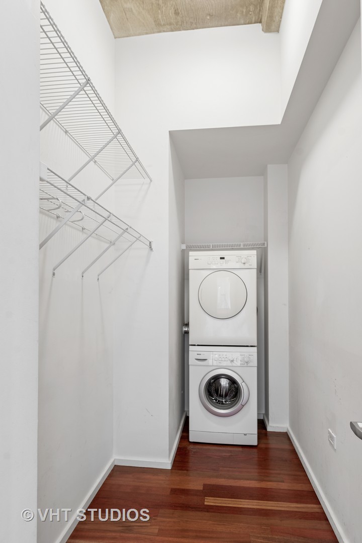 550 North St Clair Street, Unit 2105 Chicago, IL 60611 - Photo 7 of 12 a close up view of a sink and a washer and dryer
