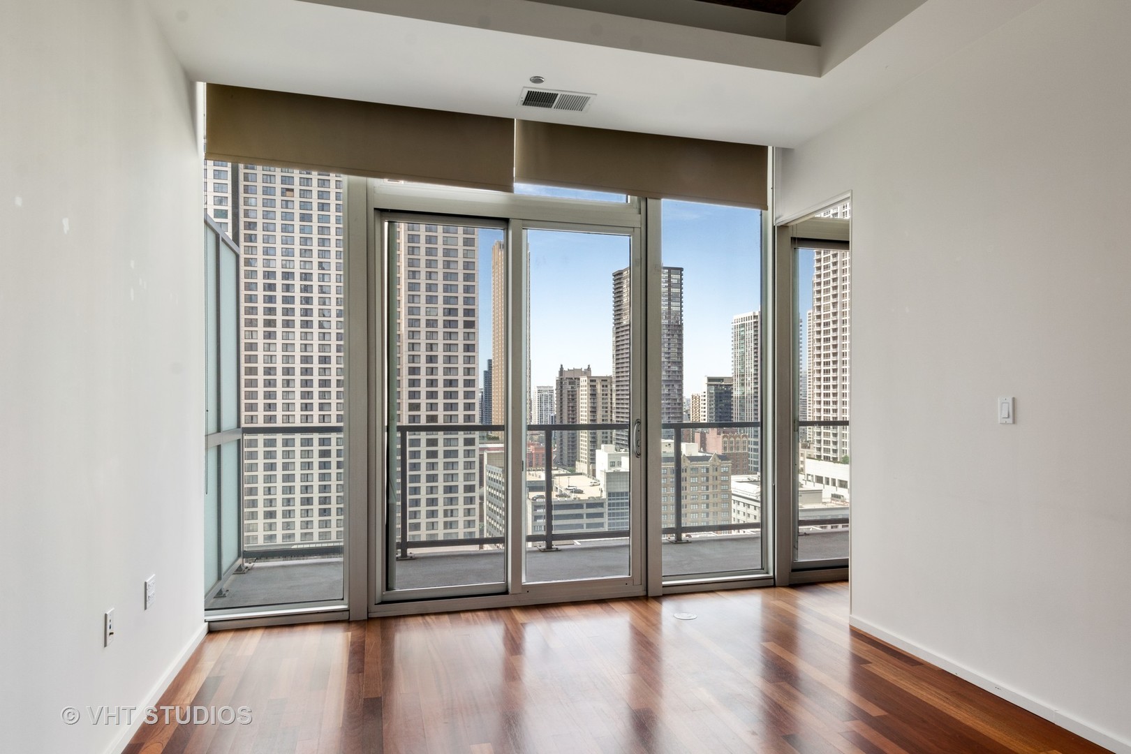 550 North St Clair Street, Unit 2105 Chicago, IL 60611 - Photo 9 of 12 a view of entryway with wooden floor