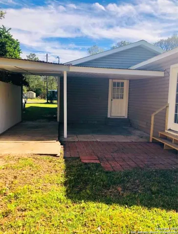 a view of a porch with a yard
