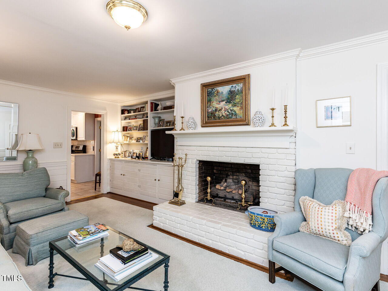 3209 Northampton Street Raleigh, NC 27609 - Photo 15 of 31 a living room with furniture and a fireplace