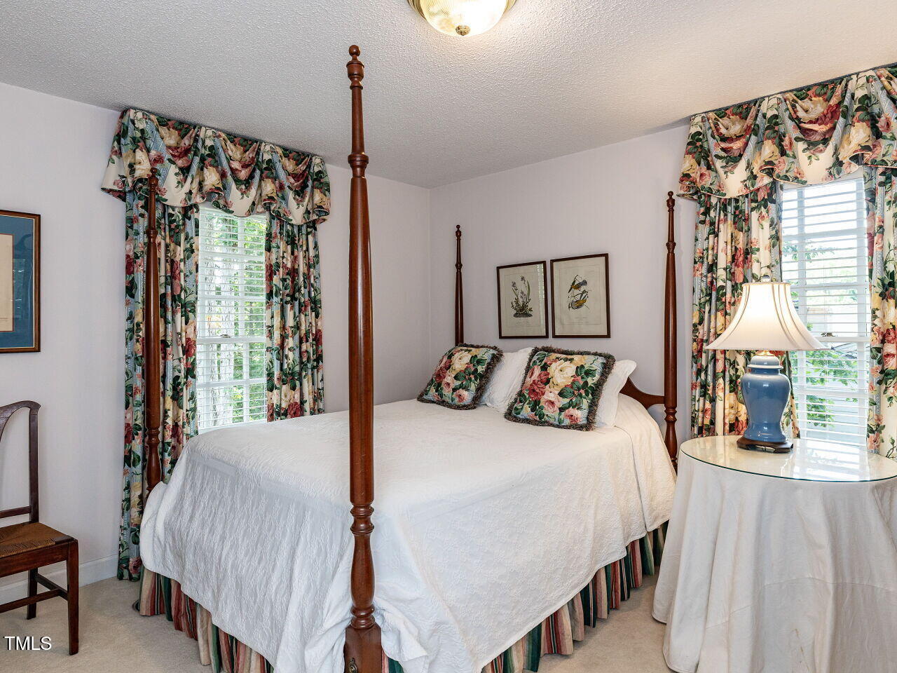 3209 Northampton Street Raleigh, NC 27609 - Photo 25 of 31 a bedroom with a bed and a window