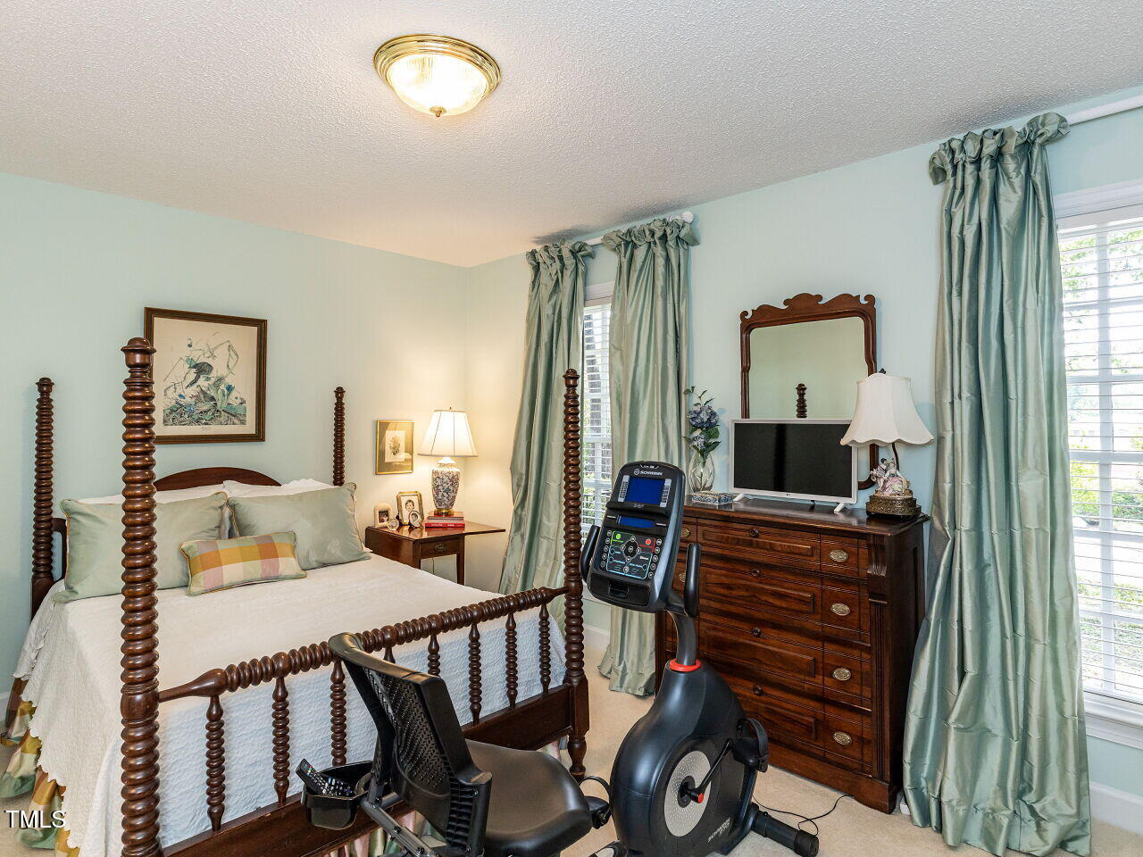 3209 Northampton Street Raleigh, NC 27609 - Photo 27 of 31 a bedroom with furniture and a window