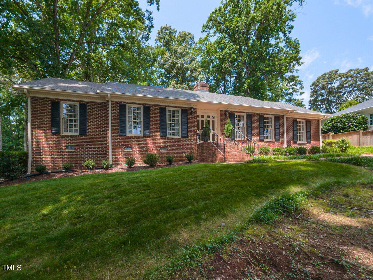 3209 Northampton Street Raleigh, NC 27609 - Photo 6 of 31 a front view of house with yard and green space