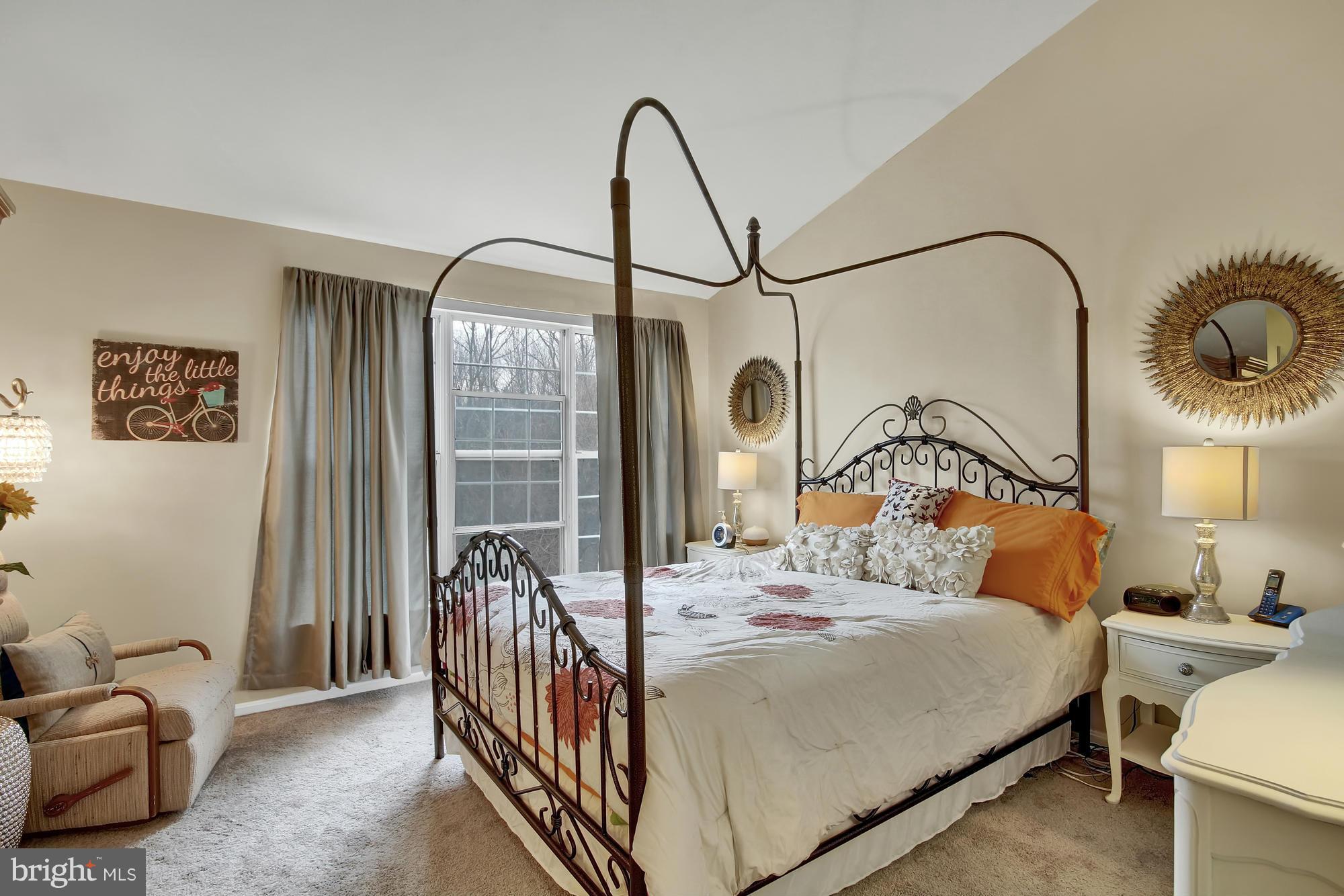 139 Gentlebrook Road Owings Mills, MD 21117 - Photo 12 of 30 a bedroom with bed and a chandelier