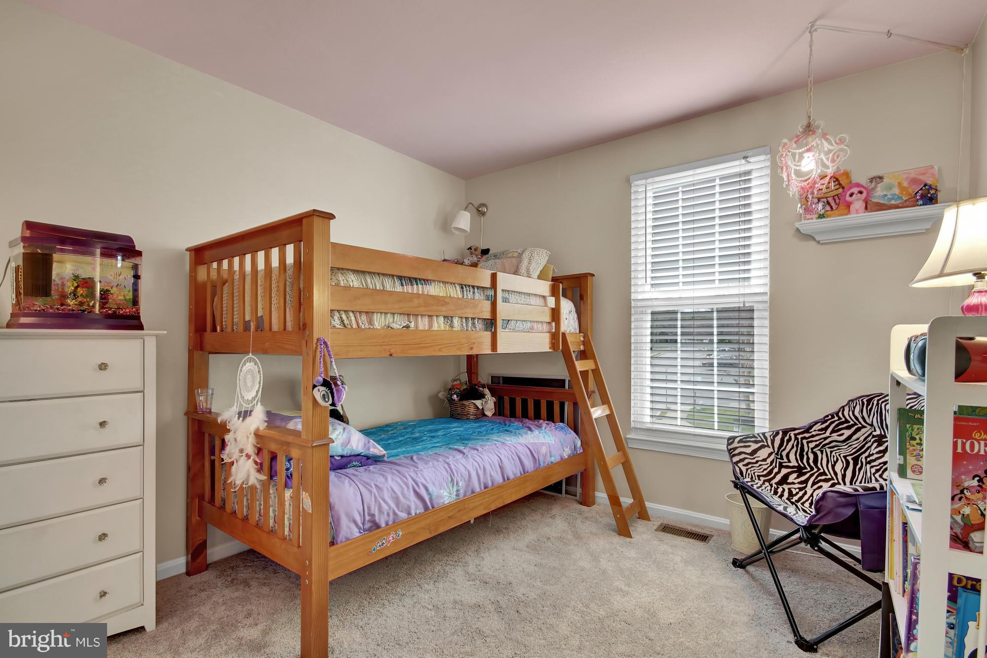 139 Gentlebrook Road Owings Mills, MD 21117 - Photo 18 of 30 a bedroom with a bed and a window
