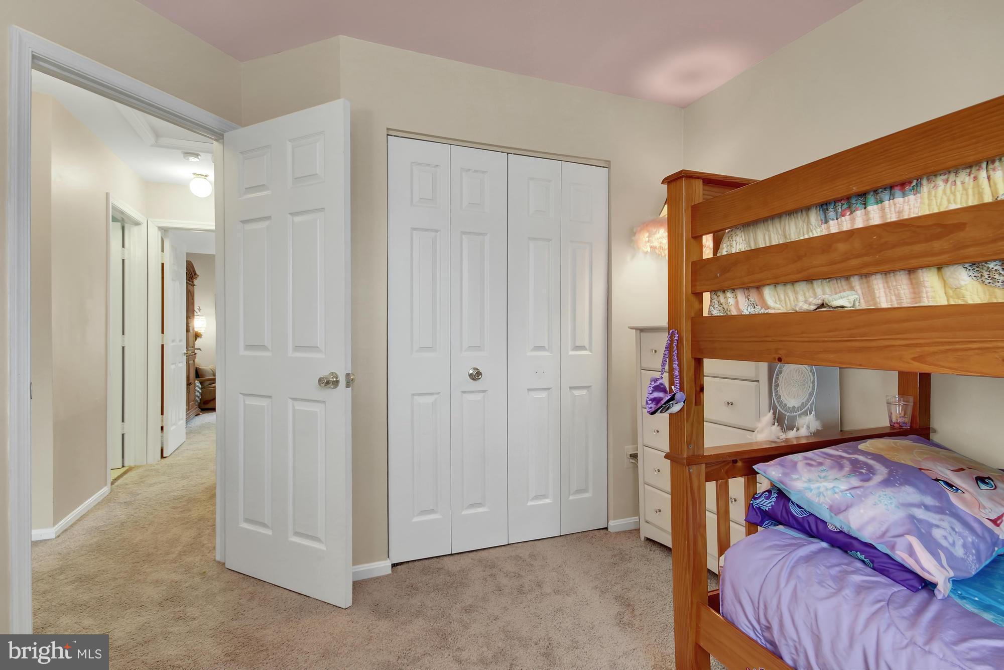 139 Gentlebrook Road Owings Mills, MD 21117 - Photo 19 of 30 a bedroom with a bed and a window