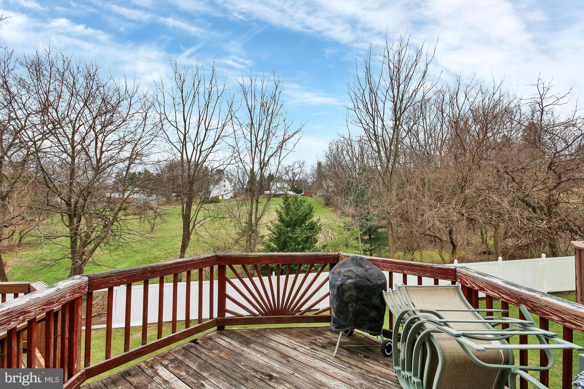 139 Gentlebrook Road Owings Mills, MD 21117 - Photo 23 of 30 a view of a roof deck with wooden floor and fence