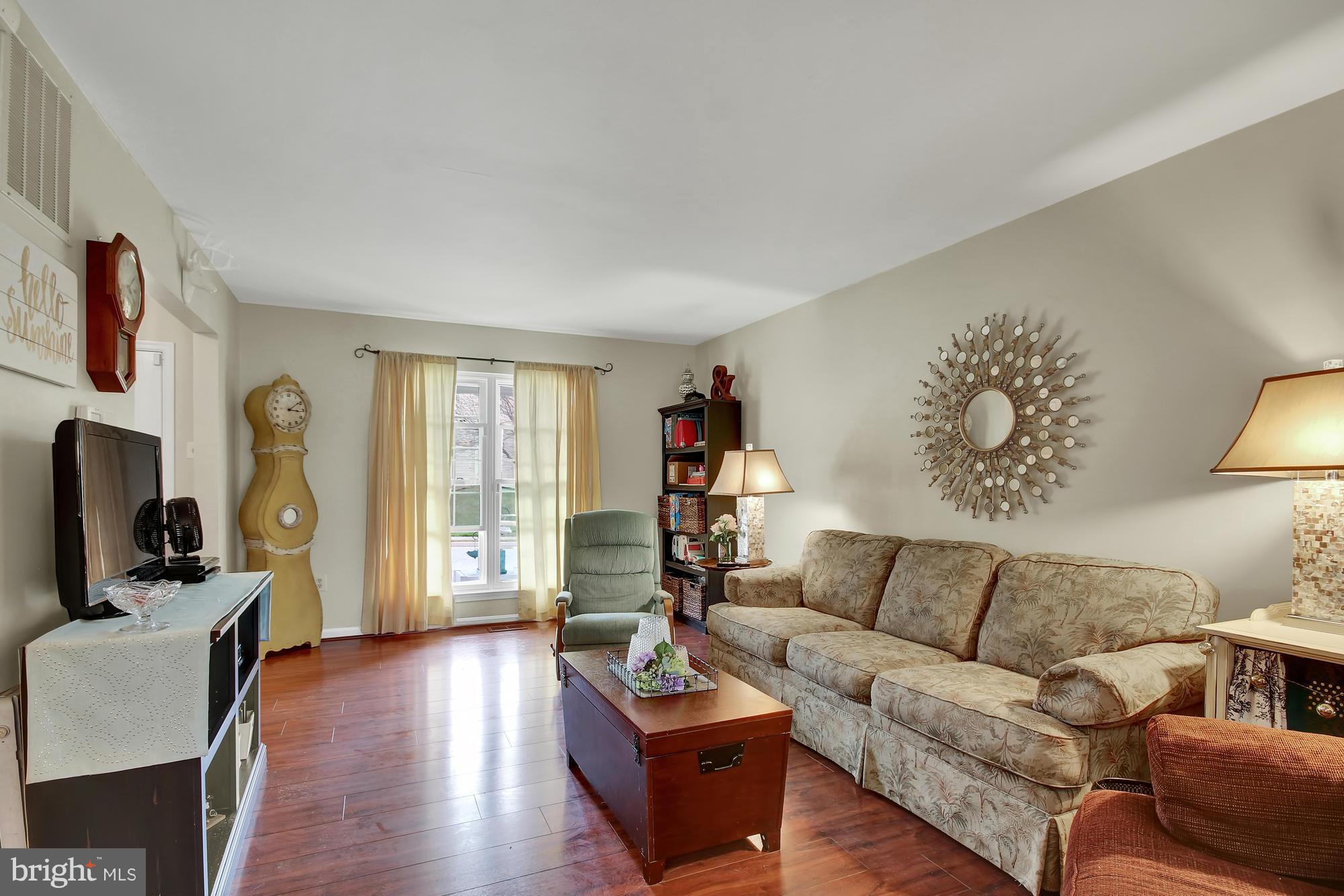 139 Gentlebrook Road Owings Mills, MD 21117 - Photo 5 of 30 a living room with furniture and wooden floor