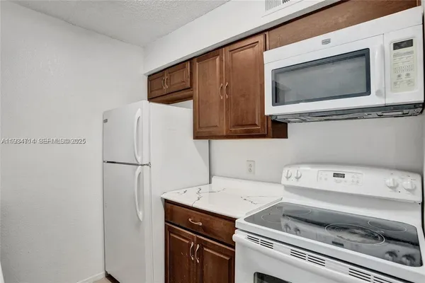 a bathroom with a sink and a window