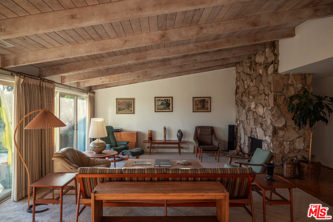 2701 Lake Hollywood Drive Los Angeles, CA 90068 - Photo 1 of 41 a living room with furniture and a window