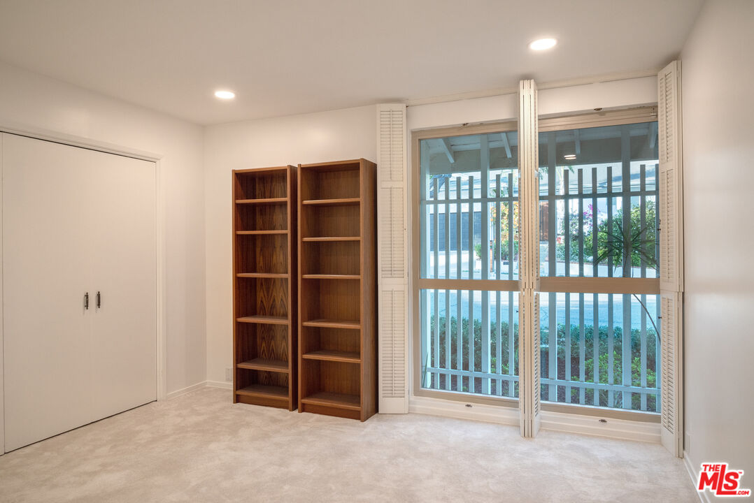 2701 Lake Hollywood Drive Los Angeles, CA 90068 - Photo 34 of 41 a view of an empty room with a cabinet and a window
