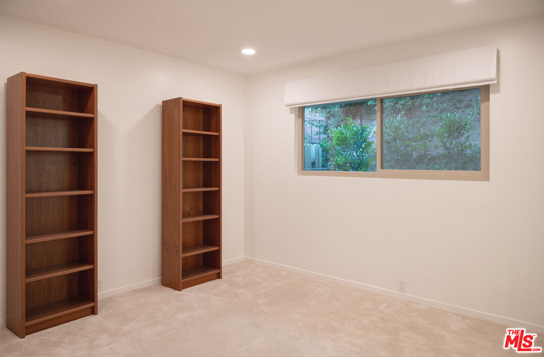 2701 Lake Hollywood Drive Los Angeles, CA 90068 - Photo 38 of 41 a view of an empty room with a window and cabinet