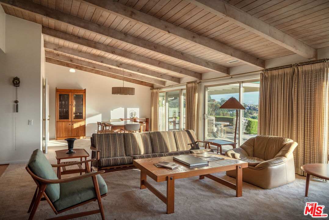 2701 Lake Hollywood Drive Los Angeles, CA 90068 - Photo 5 of 41 a living room with furniture and a large window