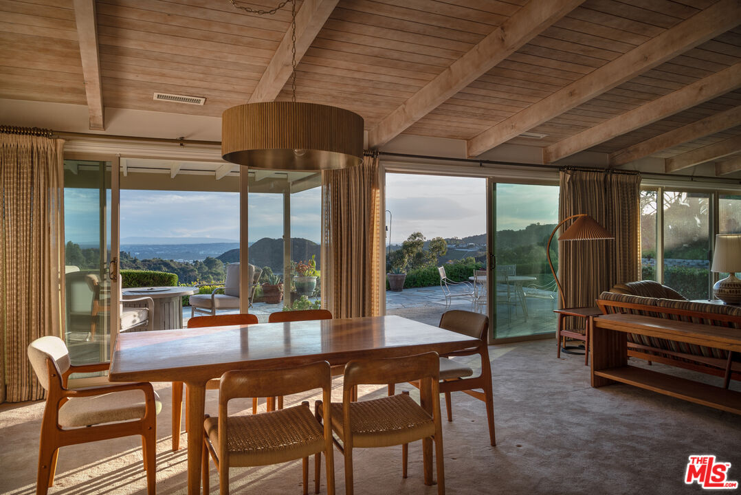 2701 Lake Hollywood Drive Los Angeles, CA 90068 - Photo 6 of 41 a outdoor space with a table and chairs