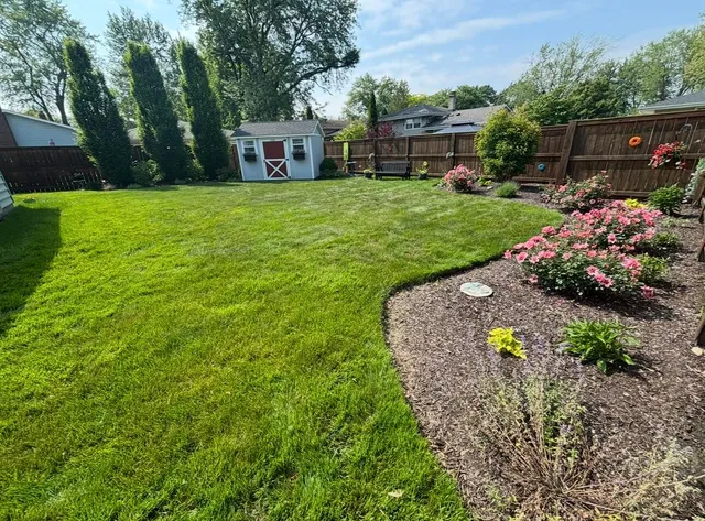a view of a garden with a fountain